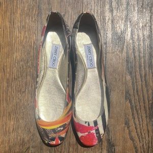 Jimmy Choo flats.